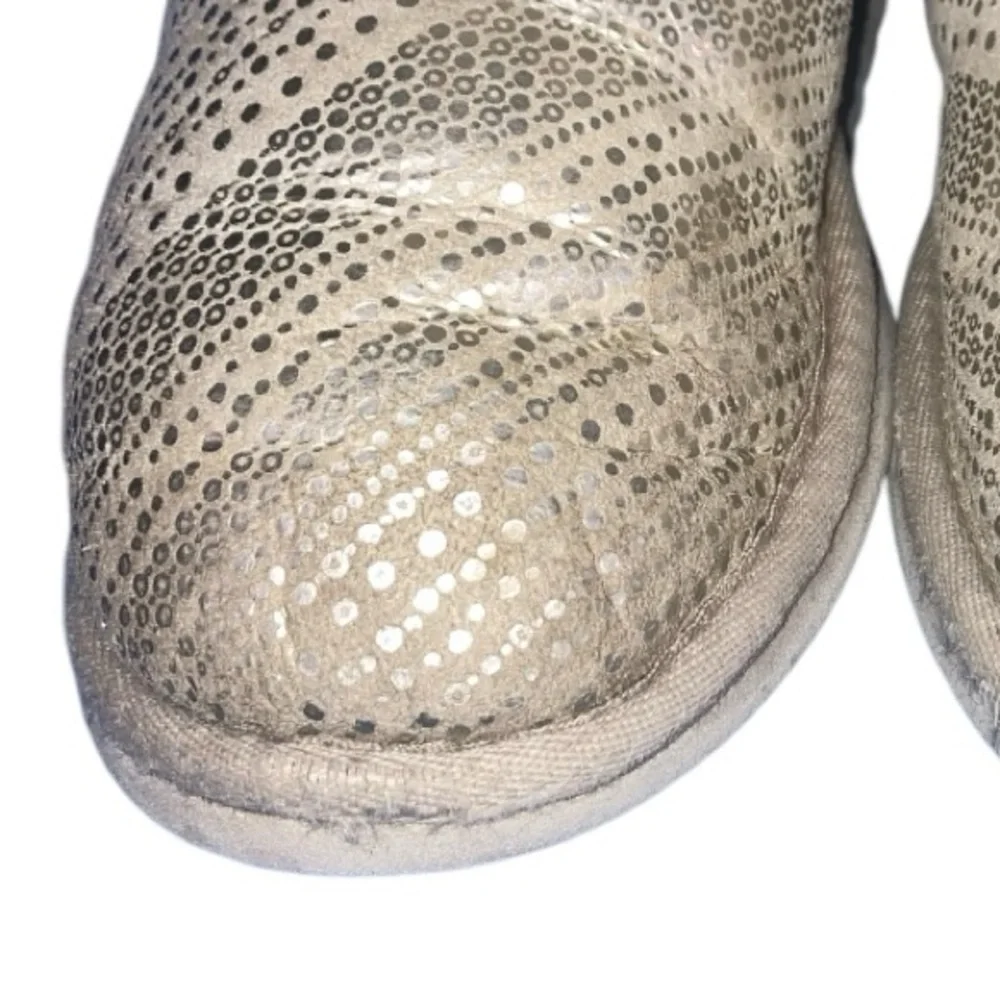 UGG Bailey Bow Bling boots in a light color boots are adorned with silky bows